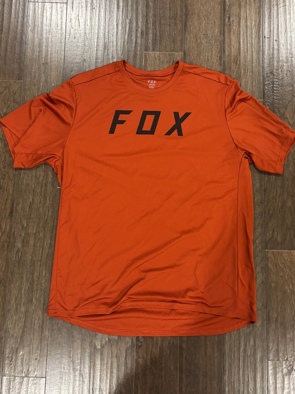 Fox Short-Sleeve Performance Tee in Orange with Black Print